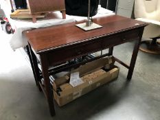 A darkwood stained hall/wall table