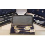 3 cased sets of serving cutlery.