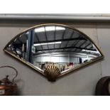A large Art Deco style fan shaped bevel edge mirror