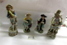 2 pairs of continental porcelain figures.