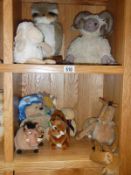 2 shelves of stuffed toys