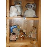 2 shelves of stuffed toys