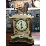 An ornate mantel clock surmounted by a Lion (no pendulum and key)