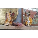 Three brass Indian dancing figurines in dress