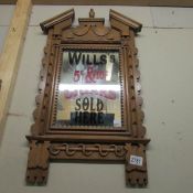 A Will's cigar advertising mirror.