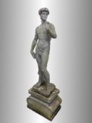 A garden statue depicting Michelangelo's David, approximately 61" tall.