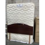 A 4'6" Myers double bed with drawer base and headboard