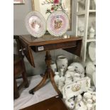 An inlaid reproduction side table