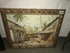 An oil on board of Village scene signed but indistinct,
