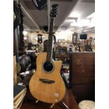 An applause (ovation) model AE28 Electro acoustic guitar with luxury hard case