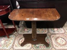 A pedestal barley twist hall table