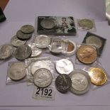 A quantity of commemorative coins.