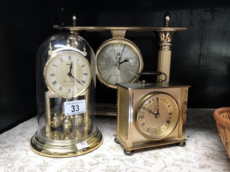 3 gilded mantle clocks