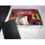 A mixed lot of cards, playing cards, dominoes etc.