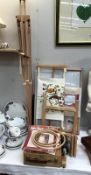 A collection of needlepoint items, stands, easels etc.