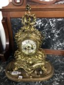 An ornate French style mantle clock