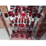 A quantity of ruby glass dishes and glasses