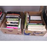 2 boxes of assorted books including military history, fishing, shooting etc.