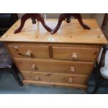 A modern solid pine chest of drawers