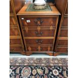 A leather topped walnut 2 drawer filing cabinet