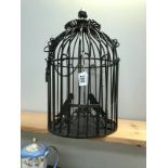 An ornamental bird cage