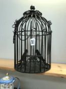 An ornamental bird cage