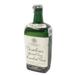 A 1950's vintage flip top bottle of Gordon's gin, 70% proof,