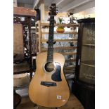 An Aria acoustic model AW100 guitar stand not included