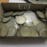 Approximately 500 grams of mainly George V silver coins.