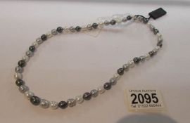 A Honora grey/white/black pearl necklace.