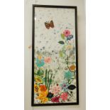 A framed and glazed watercolour on fabric with felt flower and butterfly collage