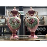 2 tall continental porcelain lidded urns