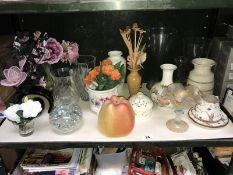 A shelf of miscellaneous including vases, a large wax apple etc.