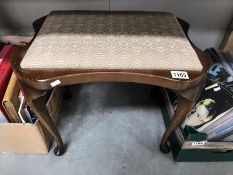 A 1930's dressing table stool with Queen Anne legs