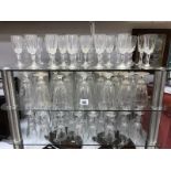 A large quantity of wine/champagne glasses