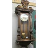 A Victorian mahogany wall clock.