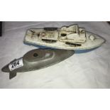 A Sutcliffe tinplate boat and a submarine