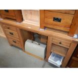 A solid oak dressing table
