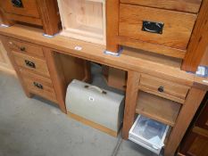 A solid oak dressing table