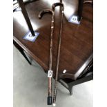 2 walking sticks,