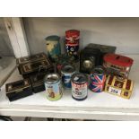 A quantity of vintage tin money boxes including Chad Valley