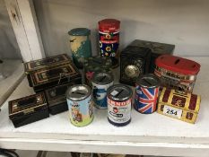 A quantity of vintage tin money boxes including Chad Valley