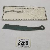 An old Chinese 'knife' coin with certificate of authentication.