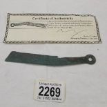 An old Chinese 'knife' coin with certificate of authentication.