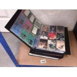 3 folders of assorted trade cards including Gil Elvgren, Jeffrey Jones, Playboy, Hershey's,