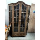 A large glazed cupboard