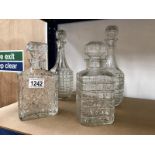 4 moulded glass decanters