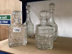 4 moulded glass decanters