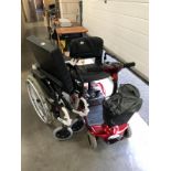 An Ultra lite 480 electric mobility scooter A/F and folding wheel chair