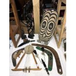An ethnographical mixed collection of tribal art, to include Papua New Guinea mask,